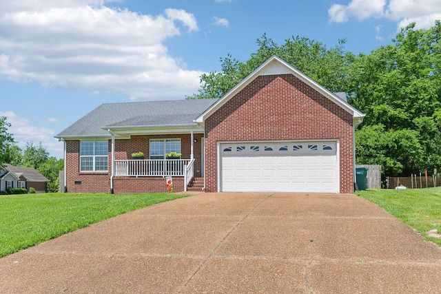 3101 Jeffrey Ct, Thompsons Station, TN 37179 - view of front of house featuring a porch, an attached garage, driveway, brick siding, and roof with shingles