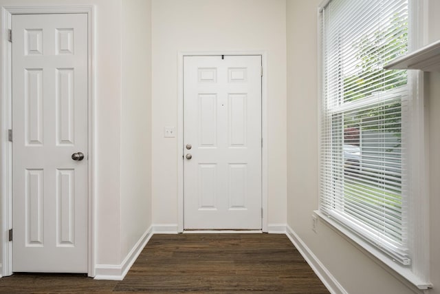 205 Blue Lake Dr, Tullahoma, TN 37388 - doorway featuring dark wood-style flooring and baseboards