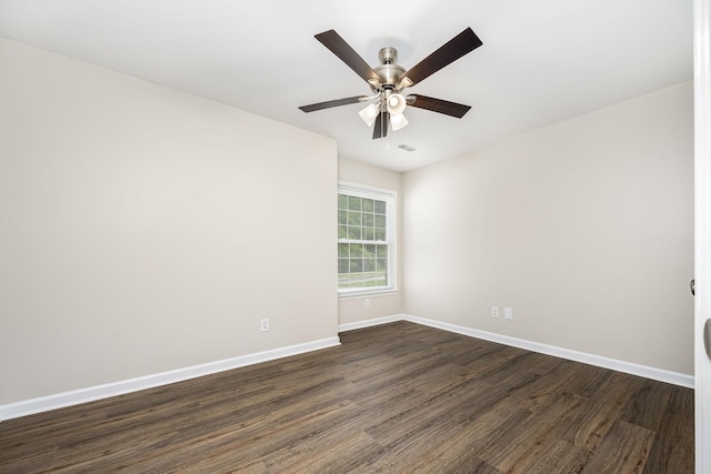 205 Blue Lake Dr, Tullahoma, TN 37388 - empty room featuring dark wood-type flooring, baseboards, and ceiling fan