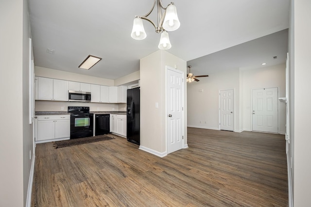 205 Blue Lake Dr, Tullahoma, TN 37388 - kitchen featuring black appliances, open floor plan, dark wood finished floors, and white cabinetry