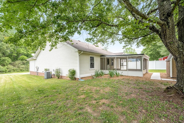 205 Blue Lake Dr, Tullahoma, TN 37388 - rear view of house with a sunroom and central AC unit