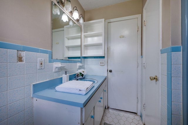 1529 W Grab Creek Rd, Dickson, TN 37055 - bathroom with tile walls, vanity, and tile patterned floors
