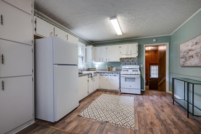 1529 W Grab Creek Rd, Dickson, TN 37055 - kitchen with white appliances, under cabinet range hood, dark wood-style flooring, crown molding, and a textured ceiling