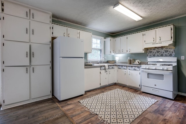 1529 W Grab Creek Rd, Dickson, TN 37055 - kitchen with white appliances, under cabinet range hood, a textured ceiling, dark wood finished floors, and white cabinetry