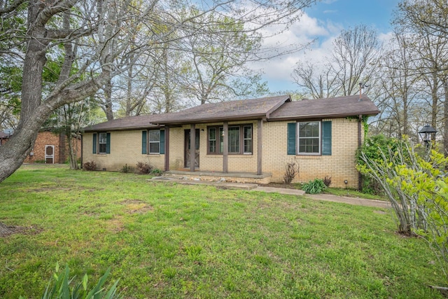 1529 W Grab Creek Rd, Dickson, TN 37055 - ranch-style home with brick siding and a front yard