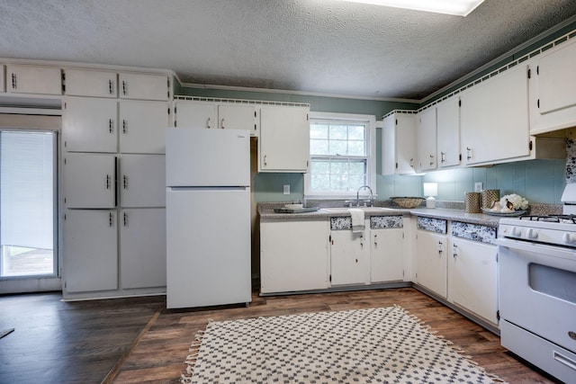 1529 W Grab Creek Rd, Dickson, TN 37055 - kitchen with white appliances, white cabinetry, a textured ceiling, dark wood-style flooring, and ornamental molding