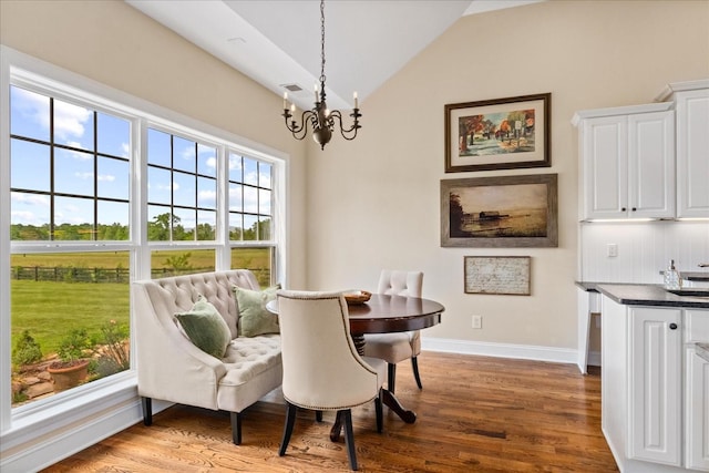 4145 Trinity Rd, Franklin, TN 37067 - dining area featuring a chandelier, baseboards, wood finished floors, and vaulted ceiling