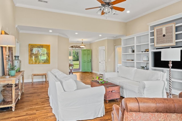 4145 Trinity Rd, Franklin, TN 37067 - living room featuring light wood-style flooring, baseboards, ceiling fan, recessed lighting, and ornamental molding