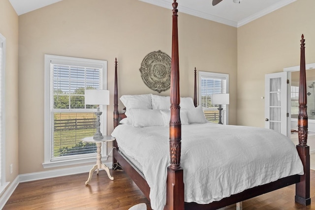 4145 Trinity Rd, Franklin, TN 37067 - bedroom with baseboards, multiple windows, wood finished floors, and crown molding