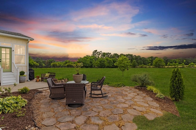 4145 Trinity Rd, Franklin, TN 37067 - patio terrace at dusk with a patio area and a yard