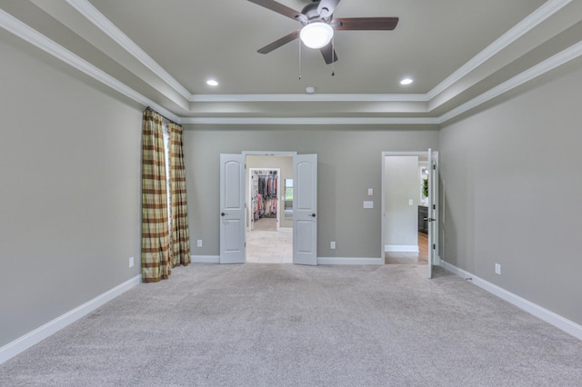 1021 Hideaway Rd, Columbia, TN 38401 - empty room featuring crown molding, a raised ceiling, light carpet, a ceiling fan, and baseboards