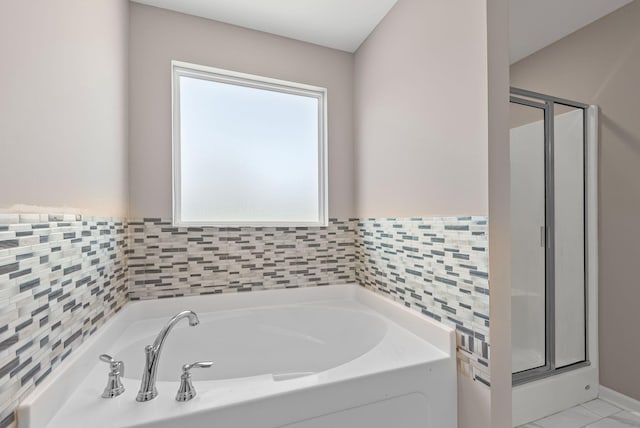 215 Ruth Way, Spring Hill, TN 37174 - full bath with a garden tub, a stall shower, tile walls, and wainscoting
