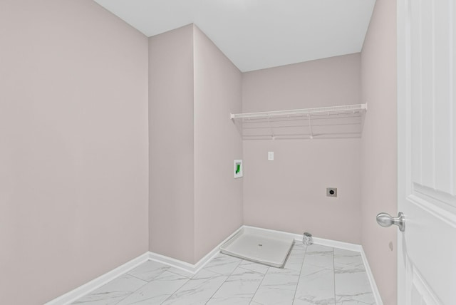 215 Ruth Way, Spring Hill, TN 37174 - laundry area with light marble finish floors, electric dryer hookup, and baseboards