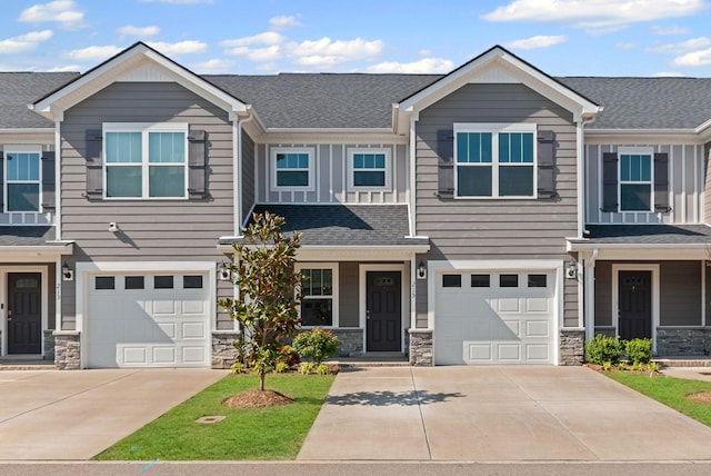 215 Ruth Way, Spring Hill, TN 37174 - view of front of property featuring stone siding, concrete driveway, and an attached garage