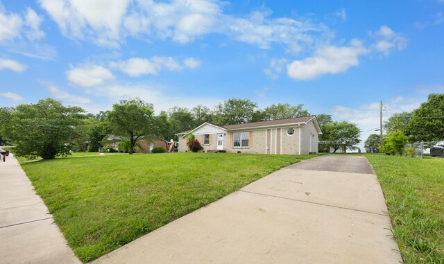209 Orchard Rd, Clarksville, TN 37042 - view of front of house featuring concrete driveway and brick siding
