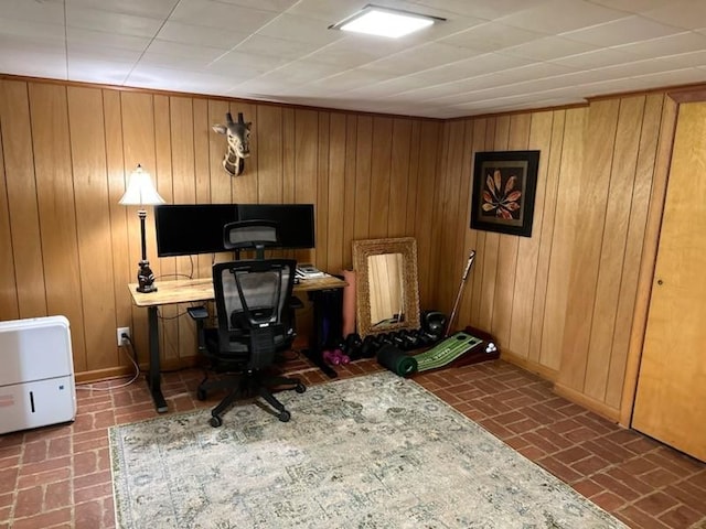108 Sunset Dr, Pulaski, TN 38478 - office area with brick patterned floors, wood walls, and baseboards