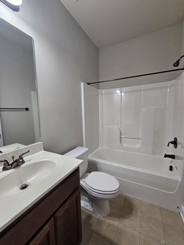 1040 Charlie Daniels Pkwy Unit 111, Mount Juliet, TN 37122 - full bathroom with tile patterned floors, toilet, bathtub / shower combination, and vanity