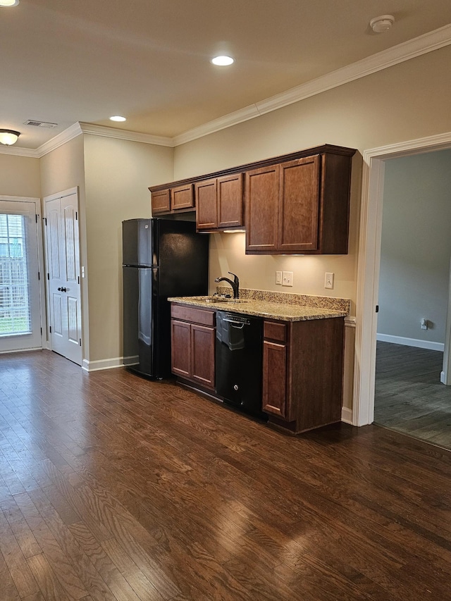 1040 Charlie Daniels Pkwy Unit 111, Mount Juliet, TN 37122 - kitchen featuring black appliances, dark wood-style floors, baseboards, crown molding, and light stone counters