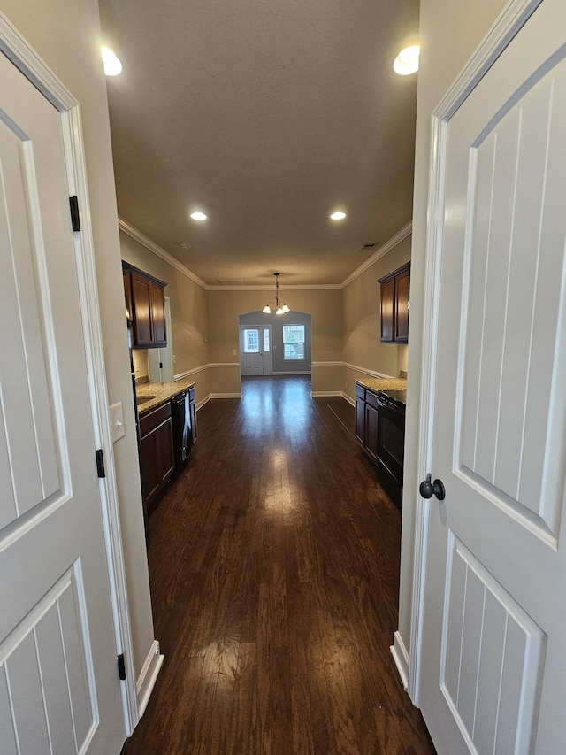 1040 Charlie Daniels Pkwy Unit 111, Mount Juliet, TN 37122 - kitchen with ornamental molding, dark wood finished floors, dark brown cabinetry, black dishwasher, and recessed lighting