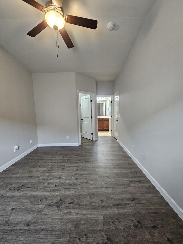 1040 Charlie Daniels Pkwy Unit 111, Mount Juliet, TN 37122 - unfurnished living room featuring baseboards, dark wood-style flooring, and ceiling fan