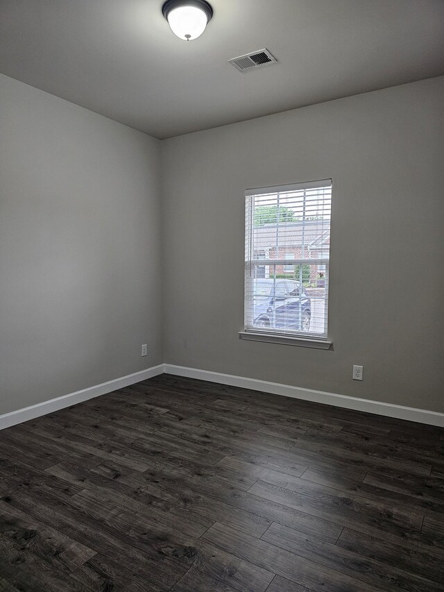 1040 Charlie Daniels Pkwy Unit 111, Mount Juliet, TN 37122 - unfurnished room with dark wood-style flooring and baseboards
