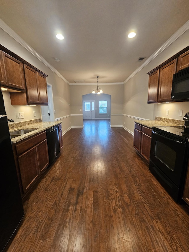 1040 Charlie Daniels Pkwy Unit 111, Mount Juliet, TN 37122 - kitchen featuring black appliances, dark wood finished floors, a chandelier, a sink, and dark brown cabinets