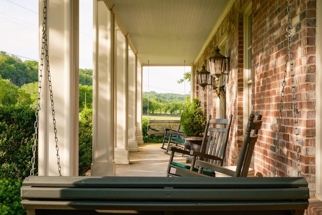 5620 Leipers Creek Rd, Franklin, TN 37064 - wooden deck featuring covered porch