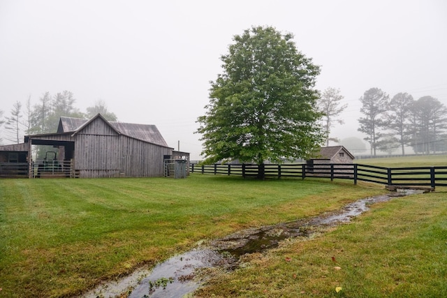 5620 Leipers Creek Rd, Franklin, TN 37064 - view of yard featuring an outbuilding and a barn