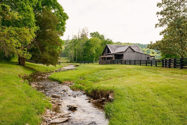 5620 Leipers Creek Rd, Franklin, TN 37064 - view of yard featuring an outdoor structure and a barn