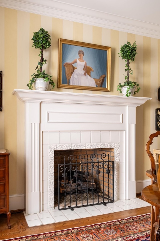 5620 Leipers Creek Rd, Franklin, TN 37064 - detailed view of a fireplace, ornamental molding, and wood finished floors