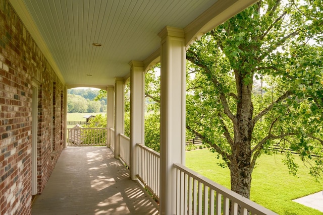 5620 Leipers Creek Rd, Franklin, TN 37064 - deck featuring covered porch and a lawn