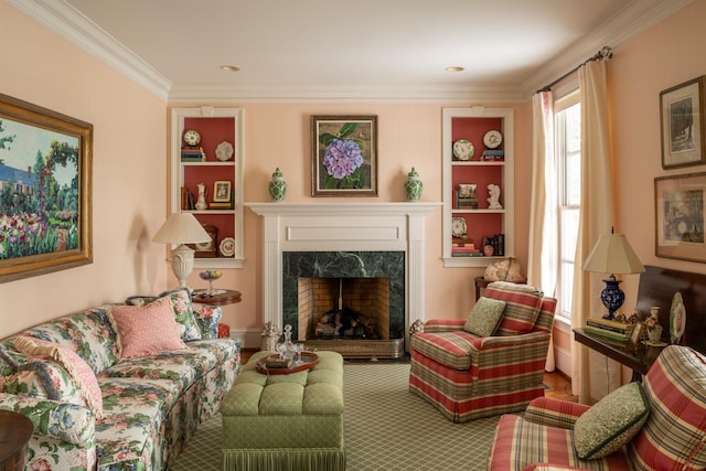 5620 Leipers Creek Rd, Franklin, TN 37064 - living area featuring a fireplace, ornamental molding, built in shelves, and carpet flooring