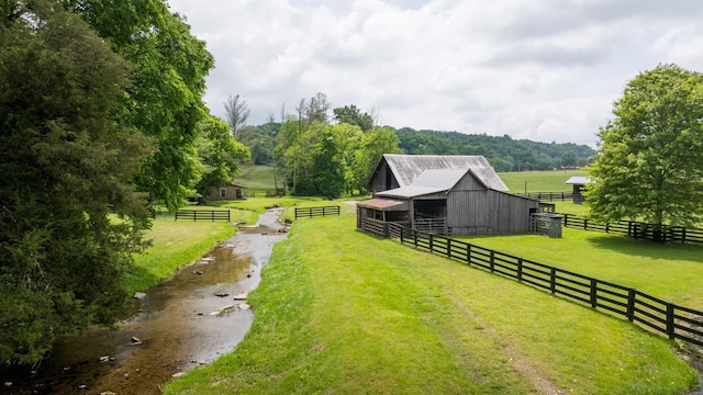 5620 Leipers Creek Rd, Franklin, TN 37064 - view of yard featuring an exterior structure, an outdoor structure, a rural view, and a barn