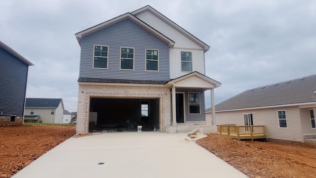 241 Cardinal Crk, Clarksville, TN 37040 - view of front of house with brick siding, driveway, and an attached garage