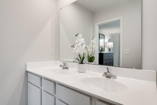 bathroom featuring double vanity