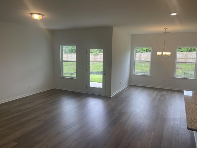 217 Summerlin Dr, Gallatin, TN 37066 - unfurnished room featuring a chandelier, healthy amount of natural light, and baseboards