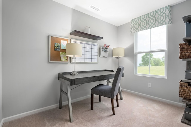 office featuring baseboards and carpet floors