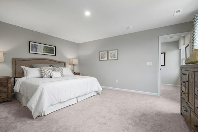 bedroom featuring carpet floors and baseboards
