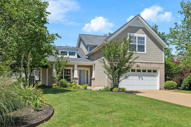 2981 Buckner Ln, Spring Hill, TN 37174 - view of front of home featuring concrete driveway, a front yard, an attached garage, a shingled roof, and brick siding