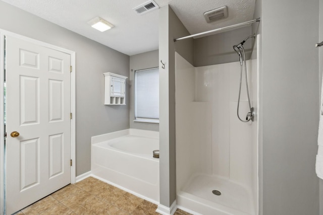 2981 Buckner Ln, Spring Hill, TN 37174 - bathroom with a garden tub, a shower, and baseboards