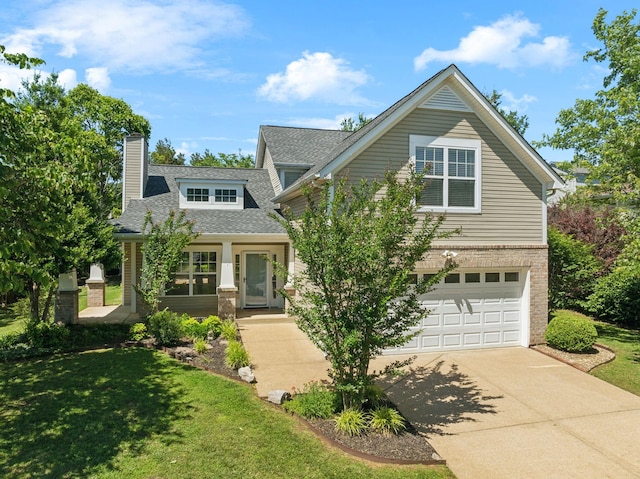 2981 Buckner Ln, Spring Hill, TN 37174 - view of front of house featuring concrete driveway, a chimney, a garage, roof with shingles, and brick siding