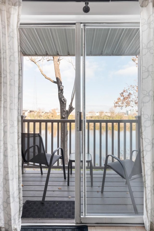 deck featuring a water view