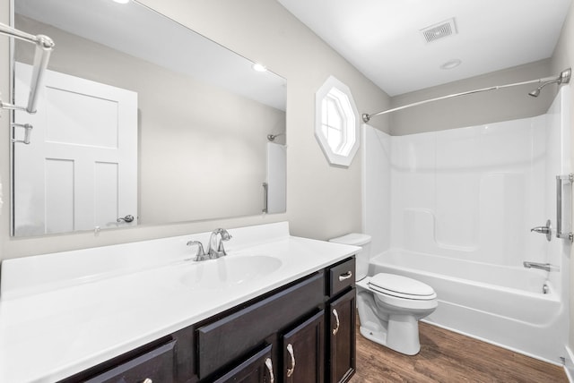 132 Fieldcrest Dr, Cadiz, KY 42211 - full bath with wood finished floors, vanity, toilet, and bathtub / shower combination