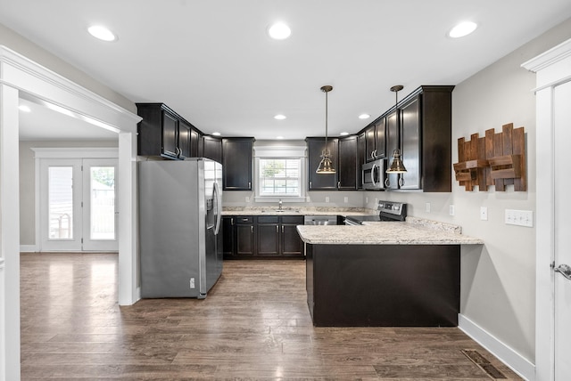 132 Fieldcrest Dr, Cadiz, KY 42211 - kitchen featuring appliances with stainless steel finishes, a sink, a peninsula, recessed lighting, and dark wood-style flooring