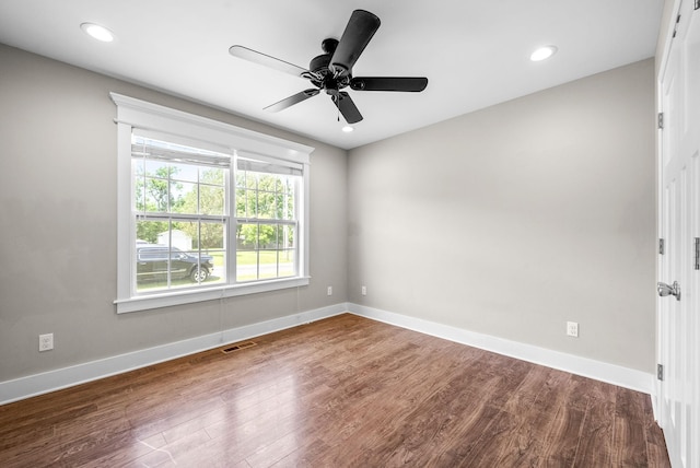 132 Fieldcrest Dr, Cadiz, KY 42211 - spare room with dark wood-style flooring, baseboards, a ceiling fan, and recessed lighting