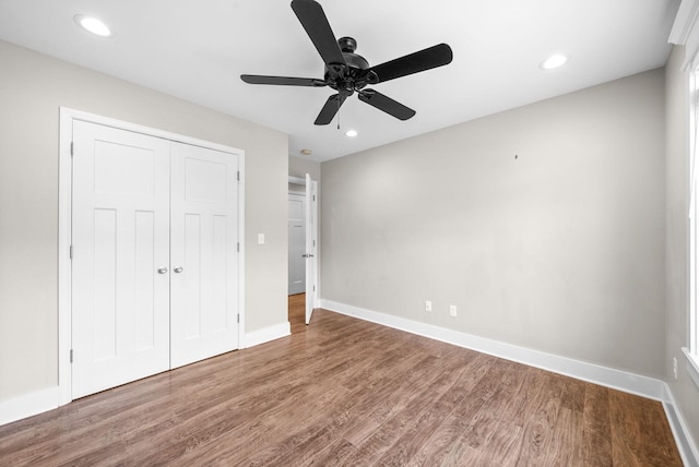 132 Fieldcrest Dr, Cadiz, KY 42211 - unfurnished bedroom with wood finished floors, baseboards, a closet, recessed lighting, and ceiling fan
