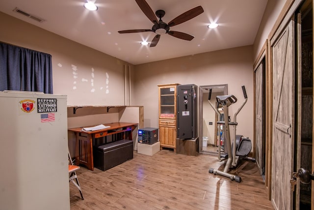 102 Highwater Rd, Waverly, TN 37185 - exercise area with light wood finished floors and a ceiling fan