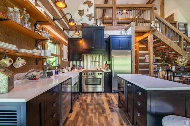 102 Highwater Rd, Waverly, TN 37185 - kitchen with open shelves, high end appliances, light countertops, dark wood-type flooring, and beverage cooler