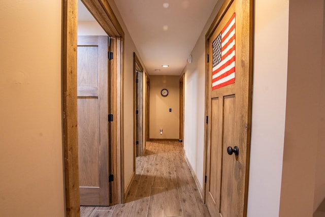 102 Highwater Rd, Waverly, TN 37185 - hallway featuring light wood finished floors, baseboards, and recessed lighting
