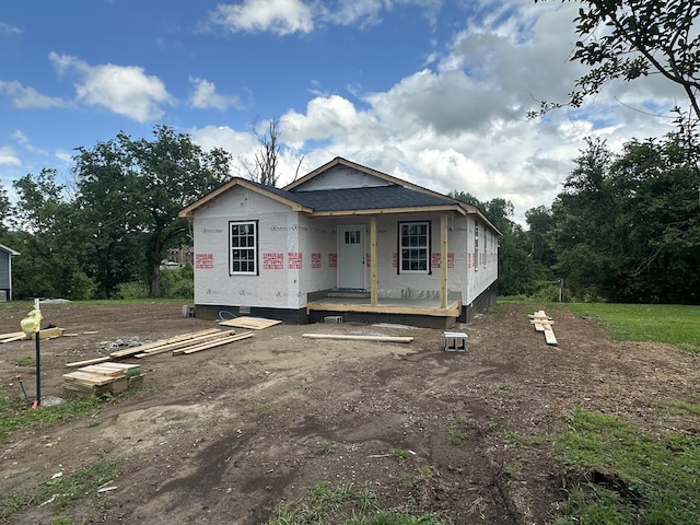 property under construction featuring covered porch